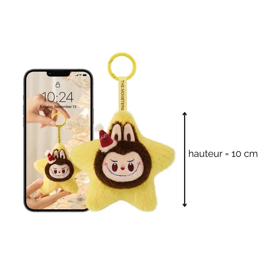 Peluche Labubu étoile jaune – comparaison taille avec iPhone (10 cm)