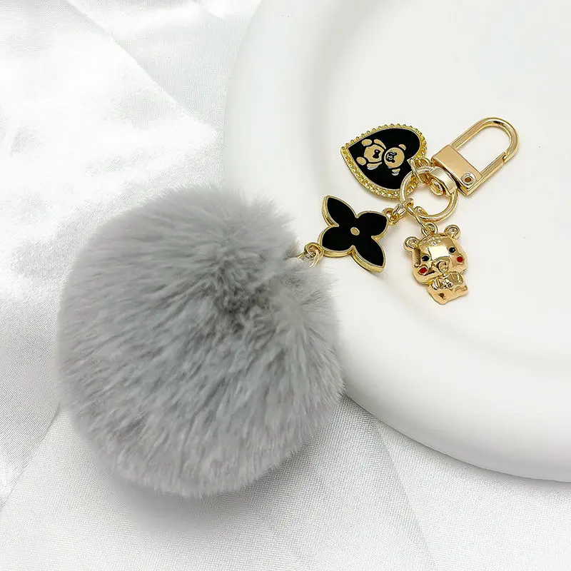 monlabubu_pompon_fluffy_adore_gris.webp